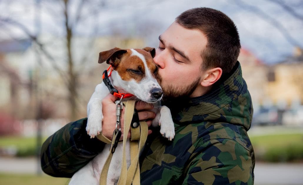 Man hugging dog 1030 x 630