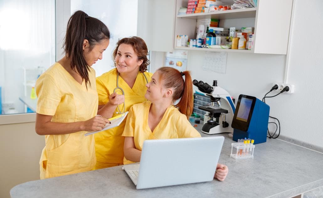 Vets in yellow scrubs 1030 x 630