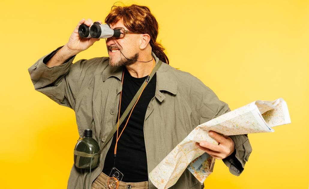 Explorer with binoculars 1030 x 630